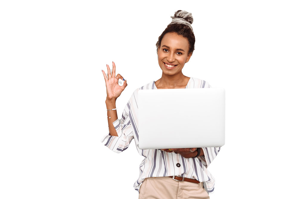 Happy woman doing an OK sign while holding her laptop in the other hand
